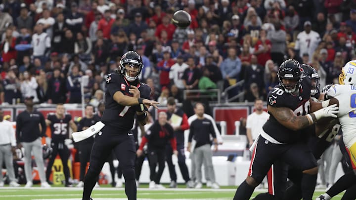 Jan 11, 2025; Houston, Texas, USA;  Houston Texans quarterback C.J. Stroud (7) throws an incomplete pass against the Los Angeles Chargers in the second quarter in an AFC wild card game at NRG Stadium. Mandatory Credit: Thomas Shea-Imagn Images