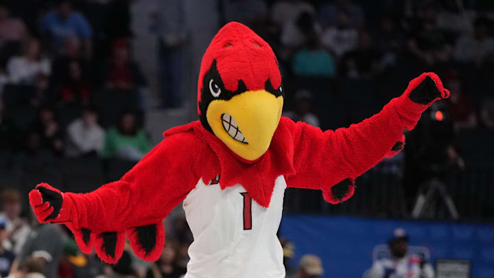 Mar 11, 2026; Charlotte, NC, USA; Louisville Cardinals mascot performs in the first half at Spectrum Center. Mandatory Credit: Bob Donnan-Imagn Images