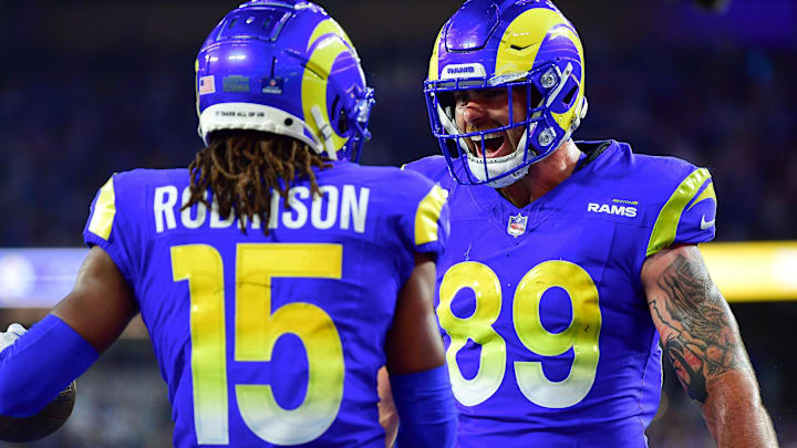 Dec 21, 2023; Inglewood, California, USA; Los Angeles Rams wide receiver Demarcus Robinson (15) celebrates his touchdown scored against the New Orleans Saints with tight end Tyler Higbee (89) during the first half at SoFi Stadium. Mandatory Credit: Gary A. Vasquez-Imagn Images