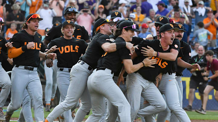 May 26 2024; Hoover, AL, USA; Tennessee players swarm relief pitcher Aaron Combs after he closed out the game with LSU at the Hoover Met to win the SEC Tournament championship game. Tennessee held on to win 4-3.