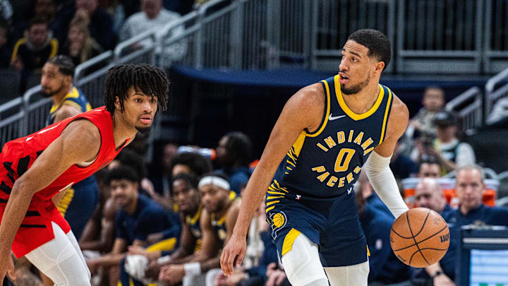 Nov 27, 2023; Indianapolis, Indiana, USA; Indiana Pacers guard Tyrese Haliburton (0) dribbles the