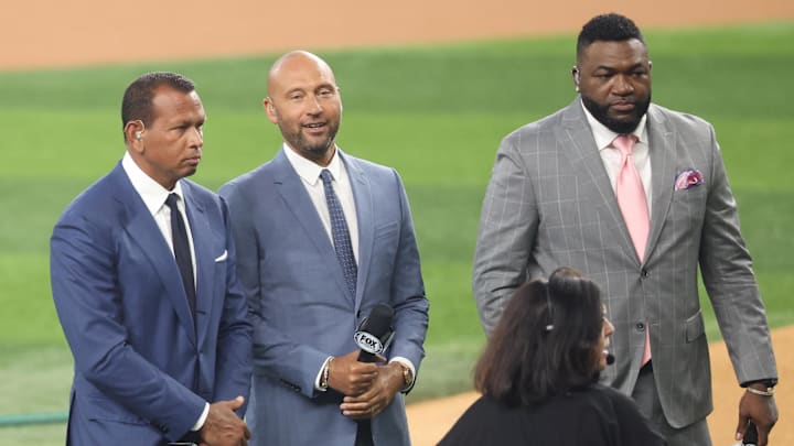 Arlington, Texas, USA; New York Yankees former players Alex Rodriguez and Derek Jeter and Boston Reds Sox former player David Ortiz look on before the 2024 MLB All-Star game at Globe Life Field.