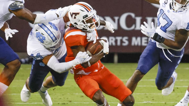 Sep 3, 2021; North Carolina linebacker Jeremiah Gemmel (44) tackles Virginia Tech wide receiver Tre Turner (11).