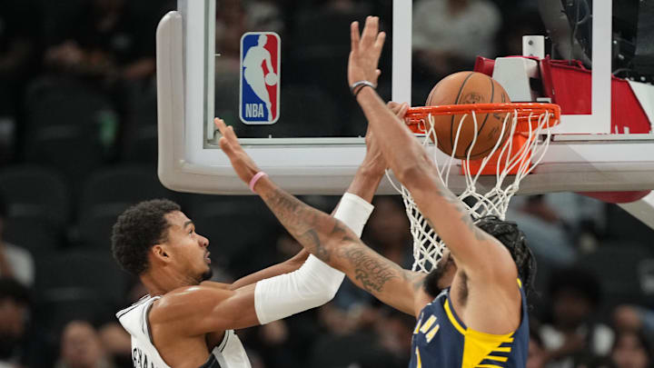 Oct 17, 2025; San Antonio, Texas, USA; San Antonio Spurs forward Victor Wembanyama (1) dunks over Indiana Pacers forward Obi Toppin (1) during the second half at Frost Bank Center. Mandatory Credit: Scott Wachter-Imagn Images Oct 17, 2025; San Antonio, Texas, USA; San Antonio Spurs forward Victor Wembanyama (1) dunks over Indiana Pacers forward Obi Toppin (1) during the second half at Frost Bank Center. Mandatory Credit: Scott Wachter-Imagn Images