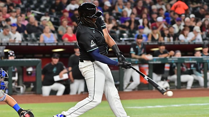 Aug 29, 2024; Phoenix, Arizona, USA; Arizona Diamondbacks first base Josh Bell (36) singles in the second inning against the New York Mets at Chase Field. Mandatory Credit: Matt Kartozian-Imagn Images Aug 29, 2024; Phoenix, Arizona, USA; Arizona Diamondbacks first base Josh Bell (36) singles in the second inning against the New York Mets at Chase Field. Mandatory Credit: Matt Kartozian-Imagn Images