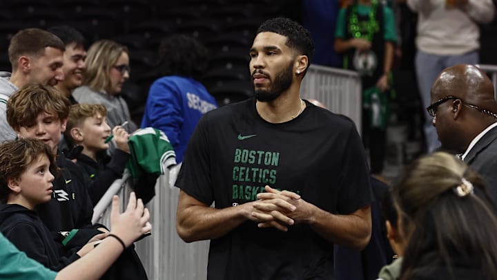Dec 2, 2024; Boston, Massachusetts, USA; Boston Celtics forward Jayson Tatum (0) takes the court for warm up before their game against the Miami Heat at TD Garden. Mandatory Credit: Winslow Townson-Imagn Images Dec 2, 2024; Boston, Massachusetts, USA; Boston Celtics forward Jayson Tatum (0) takes the court for warm up before their game against the Miami Heat at TD Garden. Mandatory Credit: Winslow Townson-Imagn Images