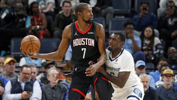 Nov 5, 2025; Memphis, Tennessee, USA; Houston Rockets forward Kevin Durant (7) handles the ball as Memphis Grizzlies forward Vince Williams Jr. (5) defends during the second quarter at FedExForum. Mandatory Credit: Petre Thomas-Imagn Images Nov 5, 2025; Memphis, Tennessee, USA; Houston Rockets forward Kevin Durant (7) handles the ball as Memphis Grizzlies forward Vince Williams Jr. (5) defends during the second quarter at FedExForum. Mandatory Credit: Petre Thomas-Imagn Images
