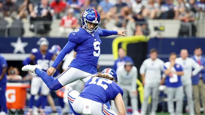 Sep 14, 2025; Arlington, Texas, USA; New York Giants place kicker Graham Gano (9) attempts a field goal against the Dallas Cowboys during the third quarter at AT&T Stadium.