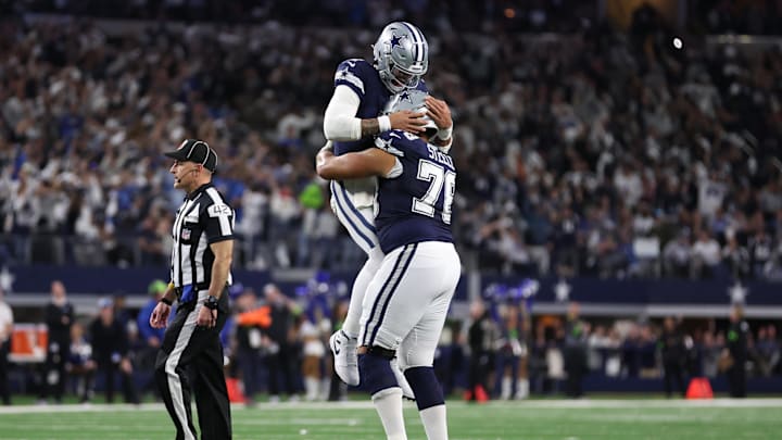 Dec 30, 2023; Arlington, Texas, USA; Dallas Cowboys quarterback Dak Prescott (4) and Dallas Cowboys