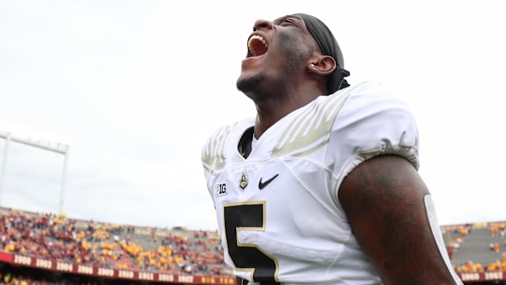 Oct 1, 2022; Minneapolis, Minnesota, USA; Purdue Boilermakers defensive end Nic Caraway (5) celebrates the win against the Minnesota Golden Gophers after the game at Huntington Bank Stadium. Mandatory Credit: Matt Krohn-USA TODAY Sports