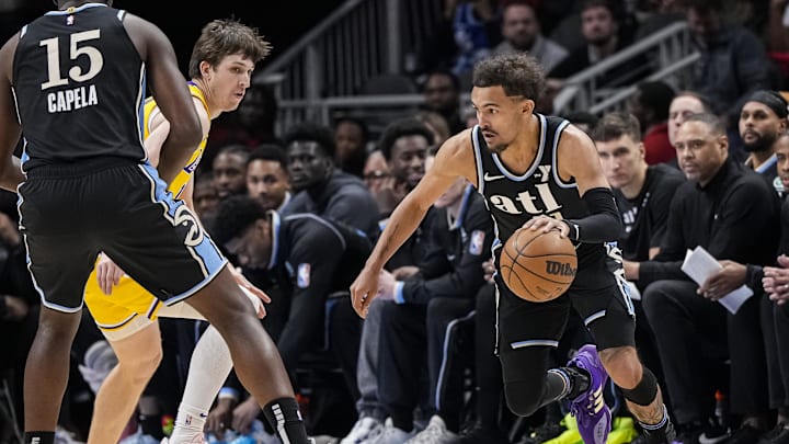 Jan 30, 2024; Atlanta, Georgia, USA; Atlanta Hawks guard Trae Young (11) dribbles against the Los Angeles Lakers during the first half at State Farm Arena. Mandatory Credit: Dale Zanine-Imagn Images Jan 30, 2024; Atlanta, Georgia, USA; Atlanta Hawks guard Trae Young (11) dribbles against the Los Angeles Lakers during the first half at State Farm Arena. Mandatory Credit: Dale Zanine-Imagn Images