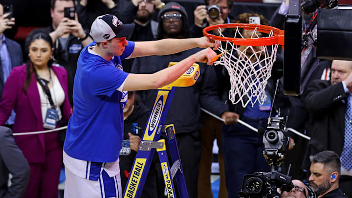 Mar 29, 2025; Newark, NJ, USA; Duke Blue Devils forward Cooper Flagg (2) cuts down the net after the Duke Blue Devils beat the Alabama Crimson Tide in the East Regional final of the 2025 NCAA tournament at Prudential Center. Mandatory Credit: Vincent Carchietta-Imagn Images