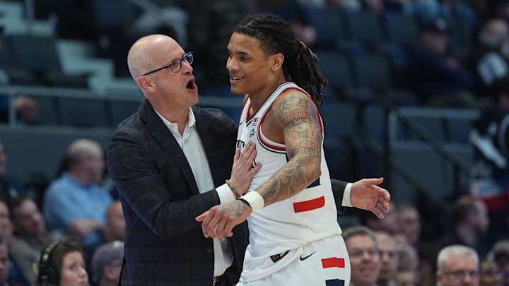 UConn Huskies head coach Dan Hurley reacts with guard Solo Ball (1) 