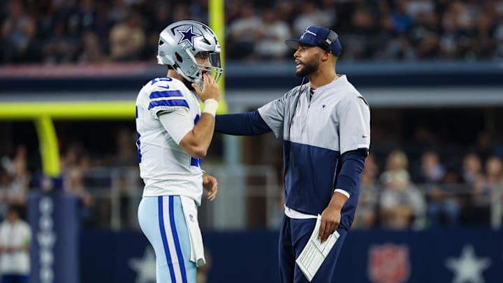 Aug 26, 2023; Arlington, Texas, USA;  Dallas Cowboys quarterback Dak Prescott (right) speaks with
