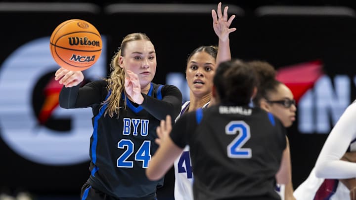 Mar 6, 2026; Kansas City, MO, USA; BYU Cougars guard Brinley Cannon (24) passes the ball to TCU Horned Frogs guard Veronica Sheffey (2) during the first half at T-Mobile Center. Mandatory Credit: Nick Tre. Smith-Imagn Images Mar 6, 2026; Kansas City, MO, USA; BYU Cougars guard Brinley Cannon (24) passes the ball to TCU Horned Frogs guard Veronica Sheffey (2) during the first half at T-Mobile Center. Mandatory Credit: Nick Tre. Smith-Imagn Images