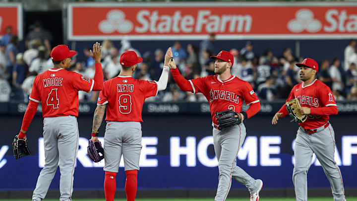 Jun 18, 2025; Bronx, New York, USA; Los Angeles Angels  left fielder Taylor Ward (3) celebrates with shortstop Zach Neto (9) and teammates after defeating the New York Yankees at Yankee Stadium. Mandatory Credit: Vincent Carchietta-Imagn Images