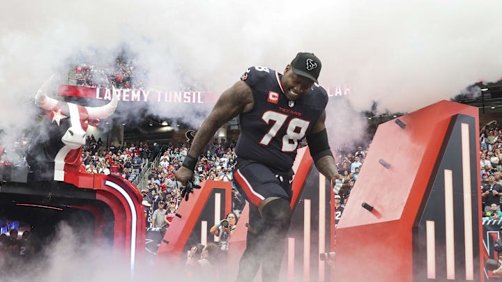 Dec 15, 2024; Houston Texans offensive tackle Laremy Tunsil (78) runs onto the field before the game against the Miami Dolphins at NRG Stadium. Mandatory Credit: Troy Taormina-Imagn Images