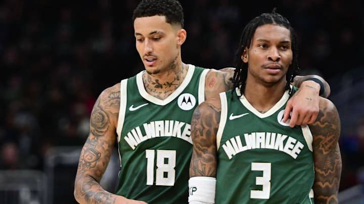 Milwaukee Bucks guard Kevin Porter is consoled by forward Kyle Kuzma after receiving a technical foul in the second quarter against the Dallas Mavericks at Fiserv Forum on March 5.