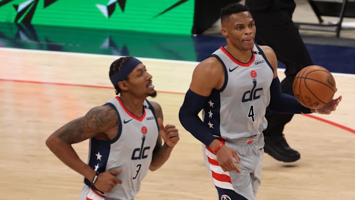 Dec 26, 2020; Washington, District of Columbia, USA; Washington Wizards guard Russell Westbrook (4) dribbles the ball next to Wizards guard Bradley Beal (3) against the Orlando Magic at Capital One Arena. Mandatory Credit: Geoff Burke-Imagn Images