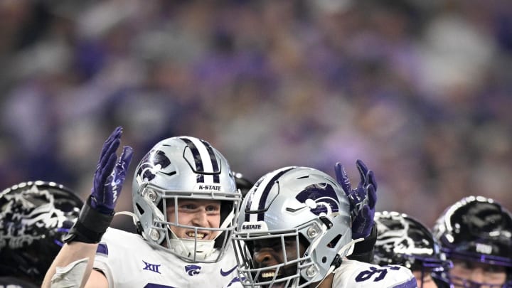 Dec 3, 2022; Arlington, TX, USA; Kansas State Wildcats defensive end Brendan Mott (38) and defensive end Felix Anudike-Uzomah (91) during the game between the TCU Horned Frogs and the Kansas State Wildcats at AT&T Stadium. Mandatory Credit: Jerome Miron-USA TODAY Sports Dec 3, 2022; Arlington, TX, USA; Kansas State Wildcats defensive end Brendan Mott (38) and defensive end Felix Anudike-Uzomah (91) during the game between the TCU Horned Frogs and the Kansas State Wildcats at AT&T Stadium. Mandatory Credit: Jerome Miron-USA TODAY Sports