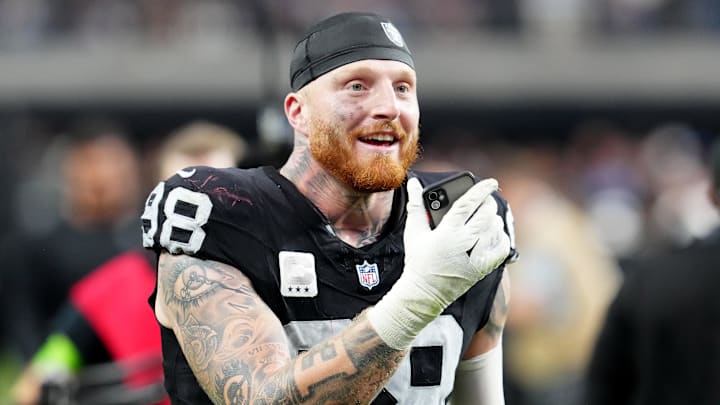 Oct 15, 2023; Paradise, Nevada, USA; Las Vegas Raiders defensive end Maxx Crosby (98) celebrates after the Raiders defeated the New England Patriots 21-17 at Allegiant Stadium. Mandatory Credit: Stephen R. Sylvanie-Imagn Images Oct 15, 2023; Paradise, Nevada, USA; Las Vegas Raiders defensive end Maxx Crosby (98) celebrates after the Raiders defeated the New England Patriots 21-17 at Allegiant Stadium. Mandatory Credit: Stephen R. Sylvanie-Imagn Images