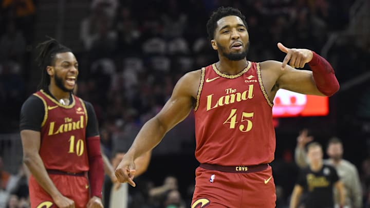 Nov 28, 2023; Cleveland, Ohio, USA; Cleveland Cavaliers guard Donovan Mitchell (45) and guard Darius Garland (10) celebrate in the second quarter against the Atlanta Hawks at Rocket Mortgage FieldHouse. Mandatory Credit: David Richard-Imagn Images
