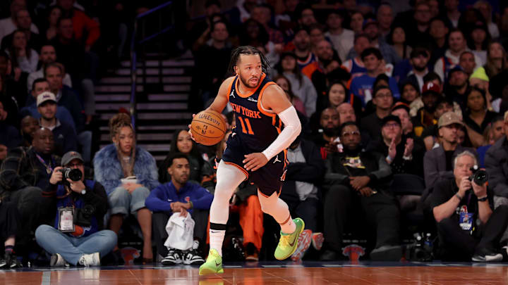 Nov 15, 2024; New York, New York, USA; New York Knicks guard Jalen Brunson (11) brings the ball up court against the Brooklyn Nets during the fourth quarter at Madison Square Garden. Mandatory Credit: Brad Penner-Imagn Images