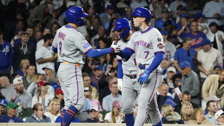 Sep 25, 2025; Chicago, Illinois, USA; New York Mets third base Brett Baty (7) is greeted by Brandon Nimmo (9) after hitting a three-run home run against the Chicago Cubs during the fourth inning at Wrigley Field. Mandatory Credit: David Banks-Imagn Images