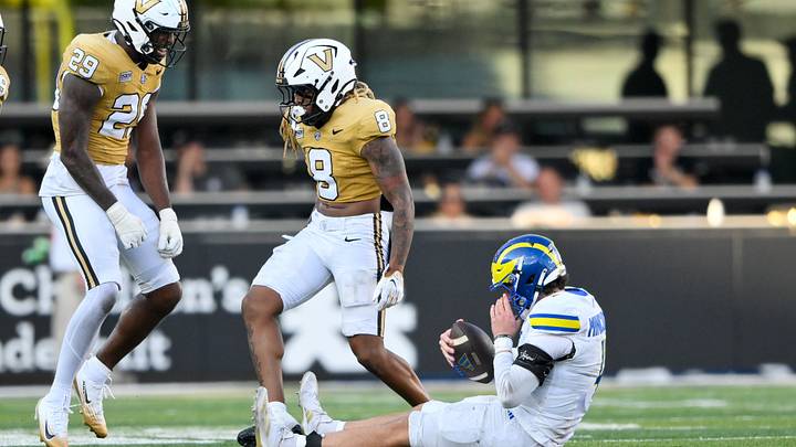 Sep 12, 2026; Nashville, Tennessee, USA; Vanderbilt Commodores safety Jalen Gilbert (9) celebrates the sack of Delaware Blue Hens quarterback Nick Minicucci (4) during the second half at FirstBank Stadium. Mandatory Credit: Steve Roberts-Imagn Images Sep 12, 2026; Nashville, Tennessee, USA; Vanderbilt Commodores safety Jalen Gilbert (9) celebrates the sack of Delaware Blue Hens quarterback Nick Minicucci (4) during the second half at FirstBank Stadium. Mandatory Credit: Steve Roberts-Imagn Images