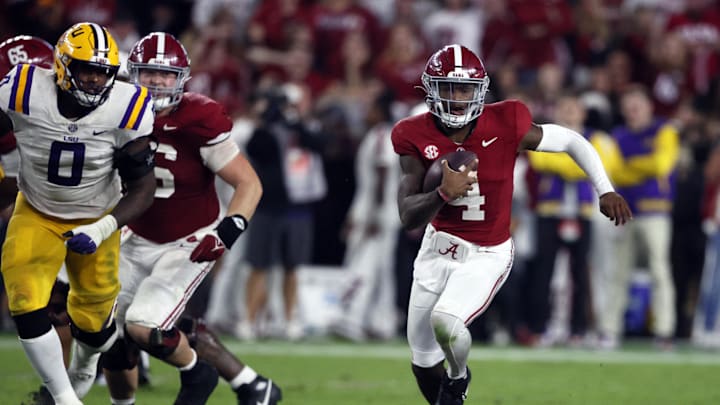 Nov 4, 2023; Tuscaloosa, Alabama, USA; Alabama Crimson Tide quarterback Jalen Milroe (4) caries the