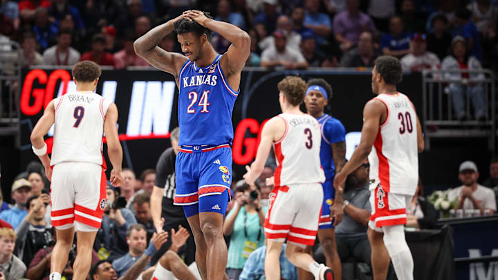 Mar 13, 2025; Kansas City, MO, USA; Kansas Jayhawks forward KJ Adams Jr. (24) reacts to a play during the second half against the Arizona Wildcats at T-Mobile Center. Mandatory Credit: William Purnell-Imagn Images