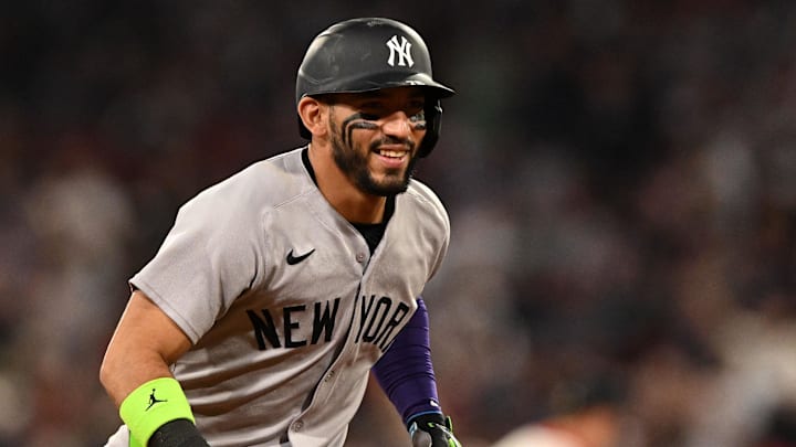 Sep 14, 2025; Boston, Massachusetts, USA;  New York Yankees shortstop Jose Caballero (72) reacts after hitting. Solo home run against the Boston Red Sox during the seventh inning at Fenway Park. Mandatory Credit: Brian Fluharty-Imagn Images