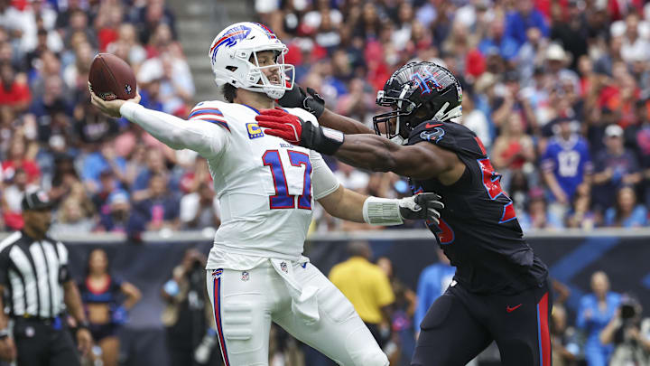 Oct 6, 2024; Houston, Texas, USA; Buffalo Bills quarterback Josh Allen (17) attempts a pass as Houston Texans defensive end Danielle Hunter (55) applies defensive pressure during the first quarter at NRG Stadium. Mandatory Credit: Troy Taormina-Imagn Images