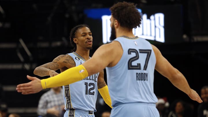Memphis Grizzlies guard Ja Morant (12) reacts with forward David Roddy following and "and-one" basket. Memphis is a short road favorite vs. Phoenix.