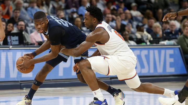 Apr 1, 2026; Memphis, Tennessee, USA; Memphis Grizzlies forward Cedric Coward (23) handles the ball as New York Knicks forward OG Anunoby (8) defends during the fourth quarter at FedExForum. Mandatory Credit: Petre Thomas-Imagn Images Apr 1, 2026; Memphis, Tennessee, USA; Memphis Grizzlies forward Cedric Coward (23) handles the ball as New York Knicks forward OG Anunoby (8) defends during the fourth quarter at FedExForum. Mandatory Credit: Petre Thomas-Imagn Images