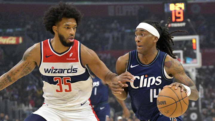 Mar 1, 2024; Los Angeles, California, USA; Washington Wizards forward Marvin Bagley III (35) guards Los Angeles Clippers guard Terance Mann (14) in the first half at Crypto.com Arena. Mandatory Credit: Jayne Kamin-Oncea-Imagn Images Mar 1, 2024; Los Angeles, California, USA; Washington Wizards forward Marvin Bagley III (35) guards Los Angeles Clippers guard Terance Mann (14) in the first half at Crypto.com Arena. Mandatory Credit: Jayne Kamin-Oncea-Imagn Images