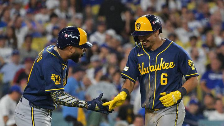 Oct 15, 2026; Los Angeles, California, USA; Milwaukee Brewers third baseman David Hamilton (6) celebrates with outfielder Jackson Chourio (11) after a solo home run against the Los Angeles Dodgers during the ninth inning in game four of the NLCS for the 2026 MLB Playoffs at Uniqlo Field at Dodger Stadium. Mandatory Credit: Jayne Kamin-Oncea-Imagn Images Oct 15, 2026; Los Angeles, California, USA; Milwaukee Brewers third baseman David Hamilton (6) celebrates with outfielder Jackson Chourio (11) after a solo home run against the Los Angeles Dodgers during the ninth inning in game four of the NLCS for the 2026 MLB Playoffs at Uniqlo Field at Dodger Stadium. Mandatory Credit: Jayne Kamin-Oncea-Imagn Images