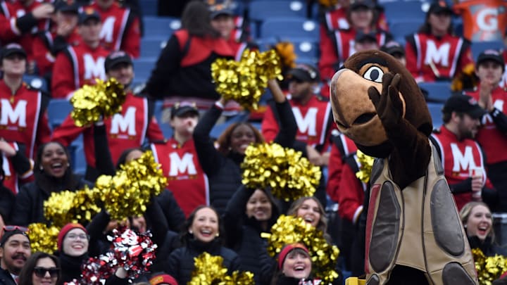 Dec 30, 2023; Nashville, TN, USA; Maryland Terrapins mascot Testudo conducts the band before the game against the Auburn Tigers at Nissan Stadium. Mandatory Credit: Christopher Hanewinckel-Imagn Images