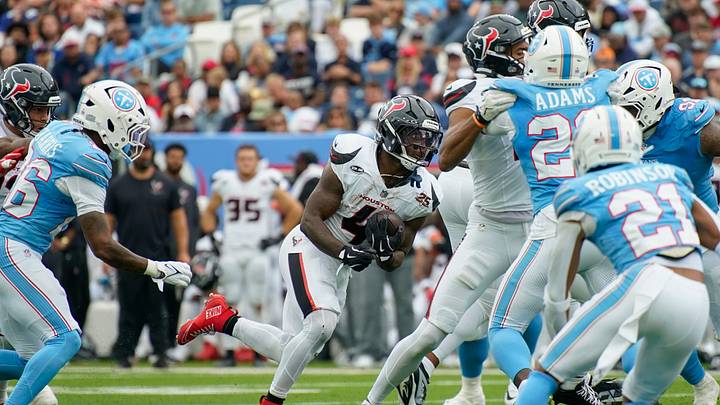 Houston Texans running back Woody Marks (4) breaks for a first down during the third quarter against the Tennessee Titans at Nissan Stadium in Nashville, Tenn., Sunday, Oct. 11, 2026. Houston Texans running back Woody Marks (4) breaks for a first down during the third quarter against the Tennessee Titans at Nissan Stadium in Nashville, Tenn., Sunday, Oct. 11, 2026.