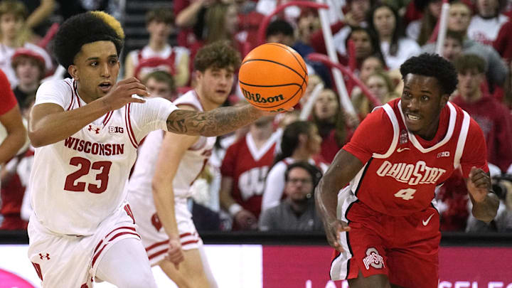 Feb 13, 2024; Madison, Wisconsin, USA;. Wisconsin guard Chucky Hepburn (23) scores on a steal 