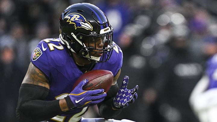 Jan 4, 2025; Baltimore, Maryland, USA;  Baltimore Ravens running back Derrick Henry (22) runs with the ball during the first quarter against the Cleveland Browns at M&T Bank Stadium. Mandatory Credit: Tommy Gilligan-Imagn Images