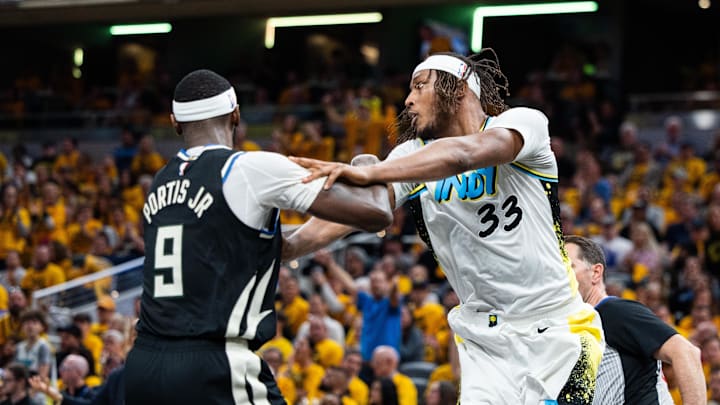 Apr 29, 2025; Indianapolis, Indiana, USA; Indiana Pacers center Myles Turner (33) separates himself from Milwaukee Bucks forward Bobby Portis (9) during game five of the first round for the 2024 NBA Playoffs at Gainbridge Fieldhouse. Mandatory Credit: Trevor Ruszkowski-Imagn Images