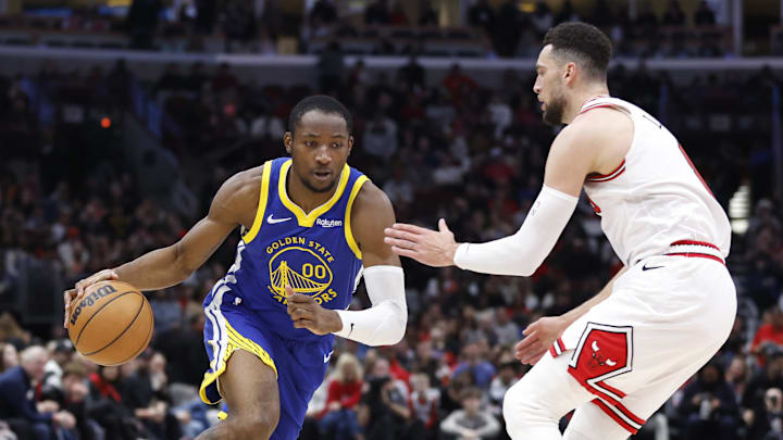 Jan 12, 2024; Chicago, Illinois, USA; Golden State Warriors forward Jonathan Kuminga (00) dribbles against Chicago Bulls guard Zach LaVine (8) during the first half at United Center. Mandatory Credit: Kamil Krzaczynski-Imagn Images Jan 12, 2024; Chicago, Illinois, USA; Golden State Warriors forward Jonathan Kuminga (00) dribbles against Chicago Bulls guard Zach LaVine (8) during the first half at United Center. Mandatory Credit: Kamil Krzaczynski-Imagn Images