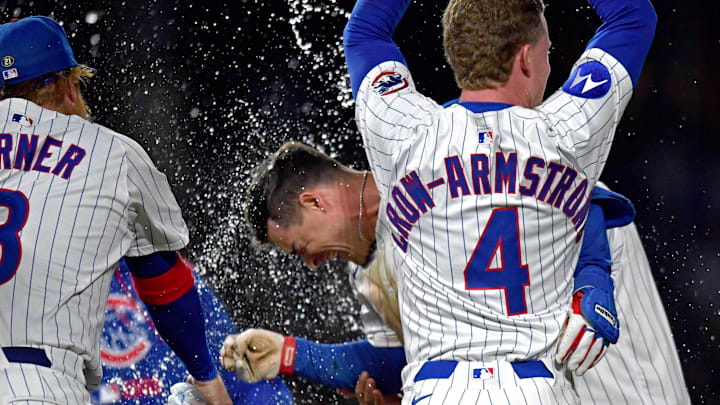 May 27, 2025; Chicago, Illinois, USA; Chicago Cubs third baseman Matt Shaw (6) celebrates with teammates after hitting a walk-off single during the eleventh inning against the Colorado Rockies at Wrigley Field. 
