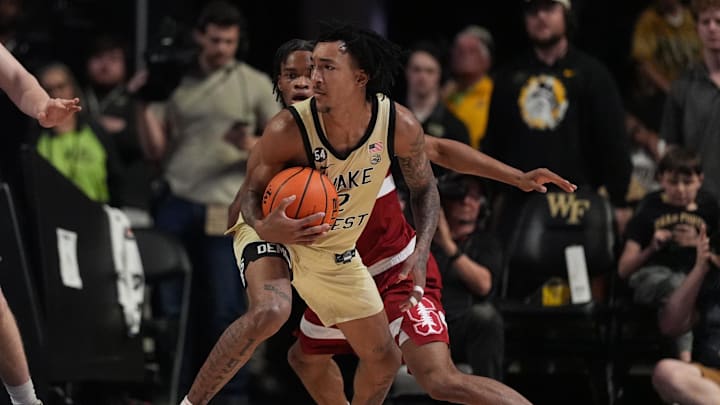 Feb 14, 2026; Winston-Salem, North Carolina, USA; Wake Forest Demon Deacons forward Juke Harris (2) looks to pass pressured by Stanford Cardinal forward Oskar Giltay (15) and guard Ebuka Okorie (1) during the second half at Lawrence Joel Veterans Memorial Coliseum. Mandatory Credit: Jim Dedmon-Imagn Images