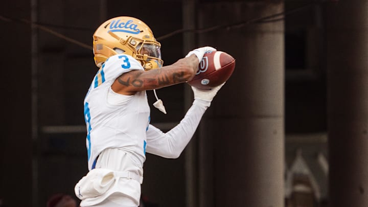 Nov 2, 2024; Lincoln, Nebraska, USA; UCLA Bruins wide receiver Kwazi Gilmer (3) warms up before a game against the Nebraska Cornhuskers at Memorial Stadium. Mandatory Credit: Dylan Widger-Imagn Images