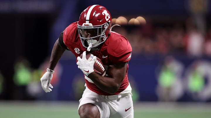 Dec 2, 2023; Atlanta, GA, USA; Alabama Crimson Tide running back Jam Miller (26) runs to score a touchdown in the second quarter against the Georgia Bulldogs at Mercedes-Benz Stadium. Mandatory Credit: Brett Davis-Imagn Images Dec 2, 2023; Atlanta, GA, USA; Alabama Crimson Tide running back Jam Miller (26) runs to score a touchdown in the second quarter against the Georgia Bulldogs at Mercedes-Benz Stadium. Mandatory Credit: Brett Davis-Imagn Images