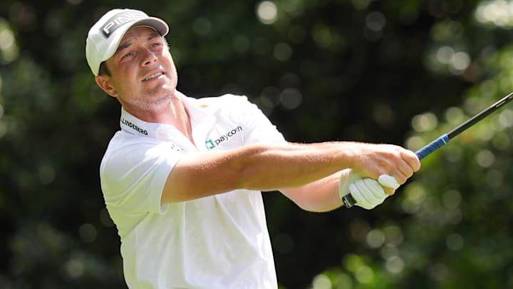 May 7, 2026; Charlotte, North Carolina, USA; Viktor Hovland tees off on fourteen during the first round of the Truist Championship golf tournament. Mandatory Credit: Jim Dedmon-Imagn Images