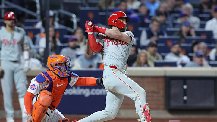 Philadelphia Phillies first baseman Bryce Harper (3) hits a double in the sixth inning against the New York Mets in game four of the NLDS for the 2024 MLB Playoffs at Citi Field on Oct 9.