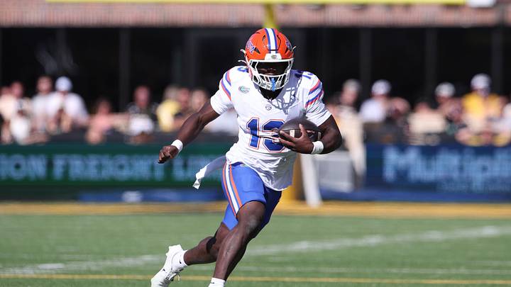 Oct 3, 2026; Columbia, Missouri, USA;  Florida Gators running back Jadan Baugh (13) carries the ball in the first quarter against the Missouri Tigers at Faurot Field at Memorial Stadium.  Mandatory Credit: William Purnell-Imagn Images
